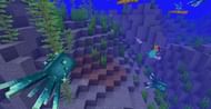 Axolotls fighting glow squid (Image via Minecraft)